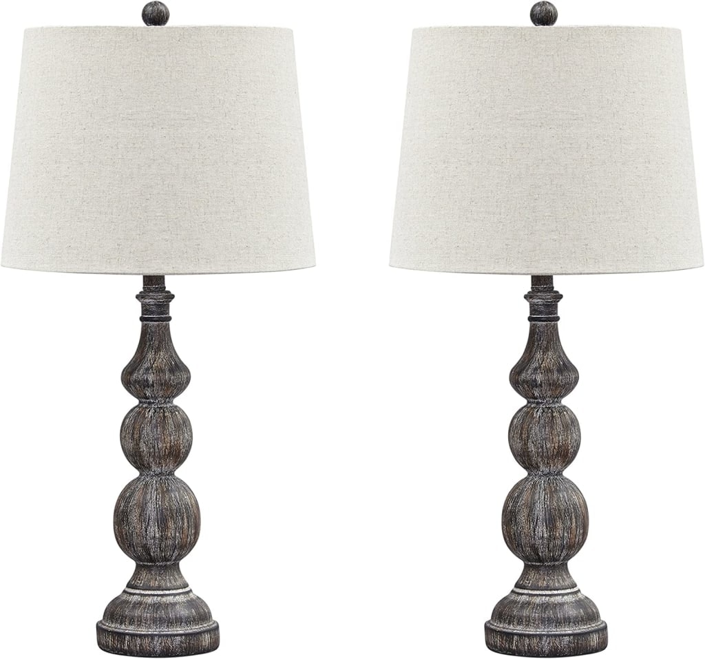 Signature Design by Ashley Mair Rustic Farmhouse Table Lamp 2-Pack: $53 Signature Design by Ashley Mair Rustic Farmhouse Table Lamp 2-Pack: $53
