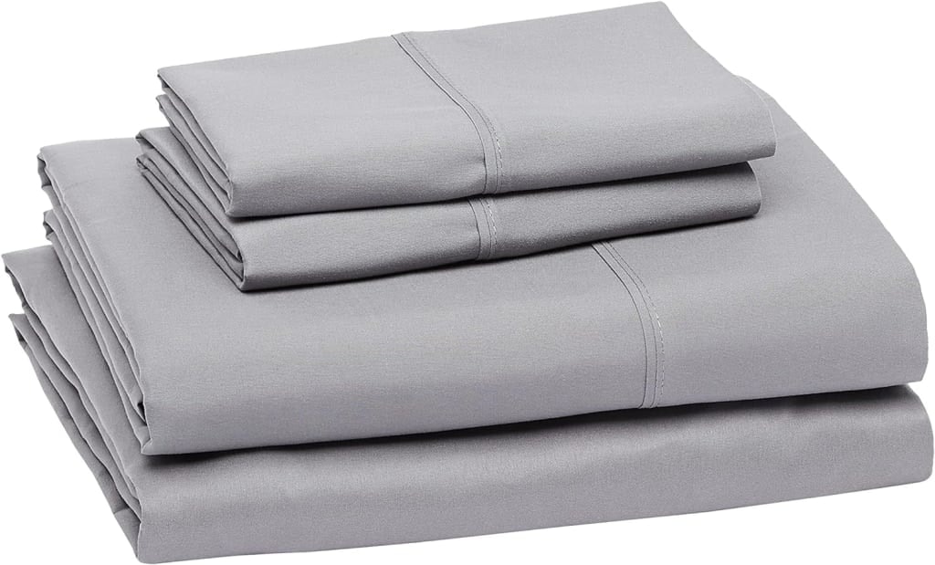 Amazon Basics Microfiber 4-Piece Queen Bed Sheet Set: $13.48