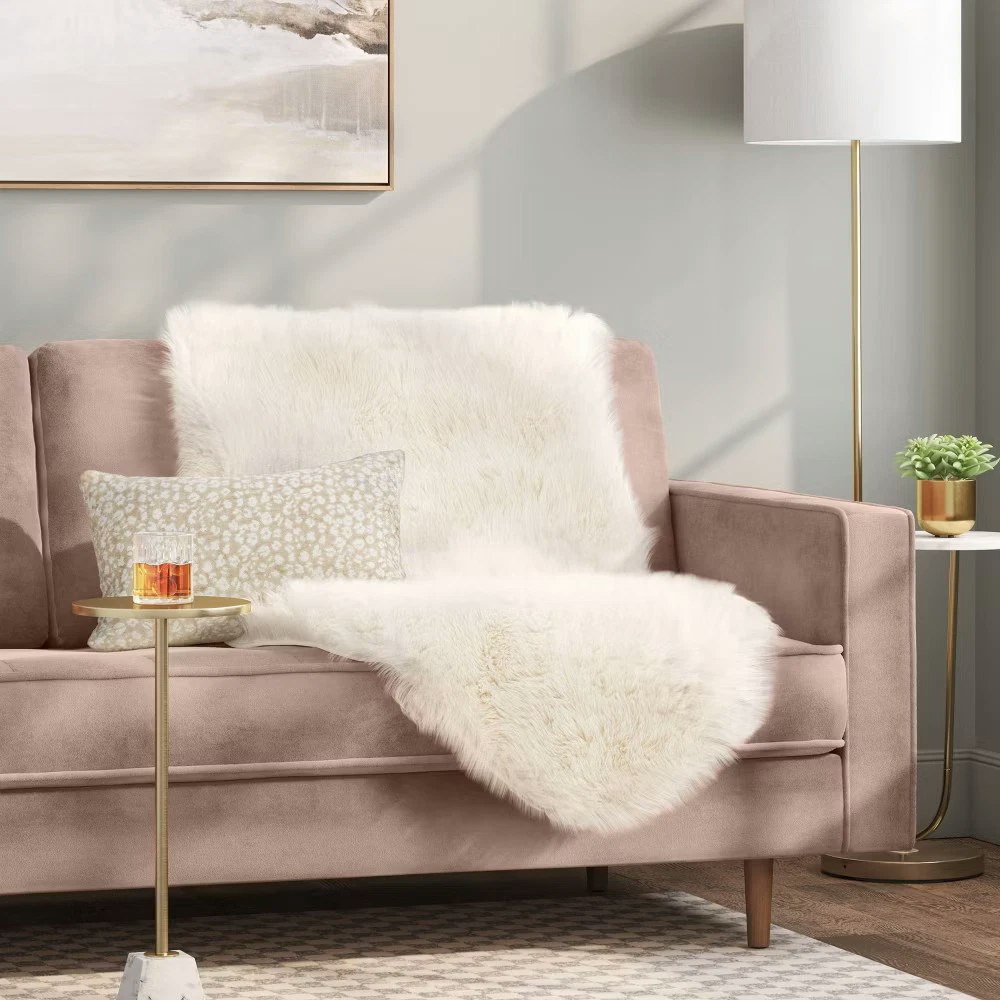Threshold 35" x 20" Pelt Sofa Throw: $12.99 Threshold 35" x 20" Pelt Sofa Throw: $12.99