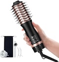Slopehill 1,000W Mini Dual-Voltage Ionic Hair Dryer Brush for $25 + free shipping w/ Prime