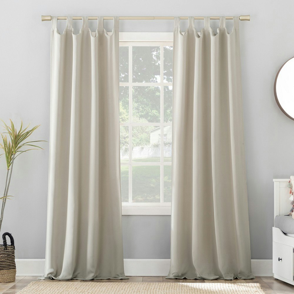 Sun Zero Kenneth 40"x63" Blackout Tab Top Curtain Panel: $10.99 Sun Zero Kenneth 40"x63" Blackout Tab Top Curtain Panel: $10.99