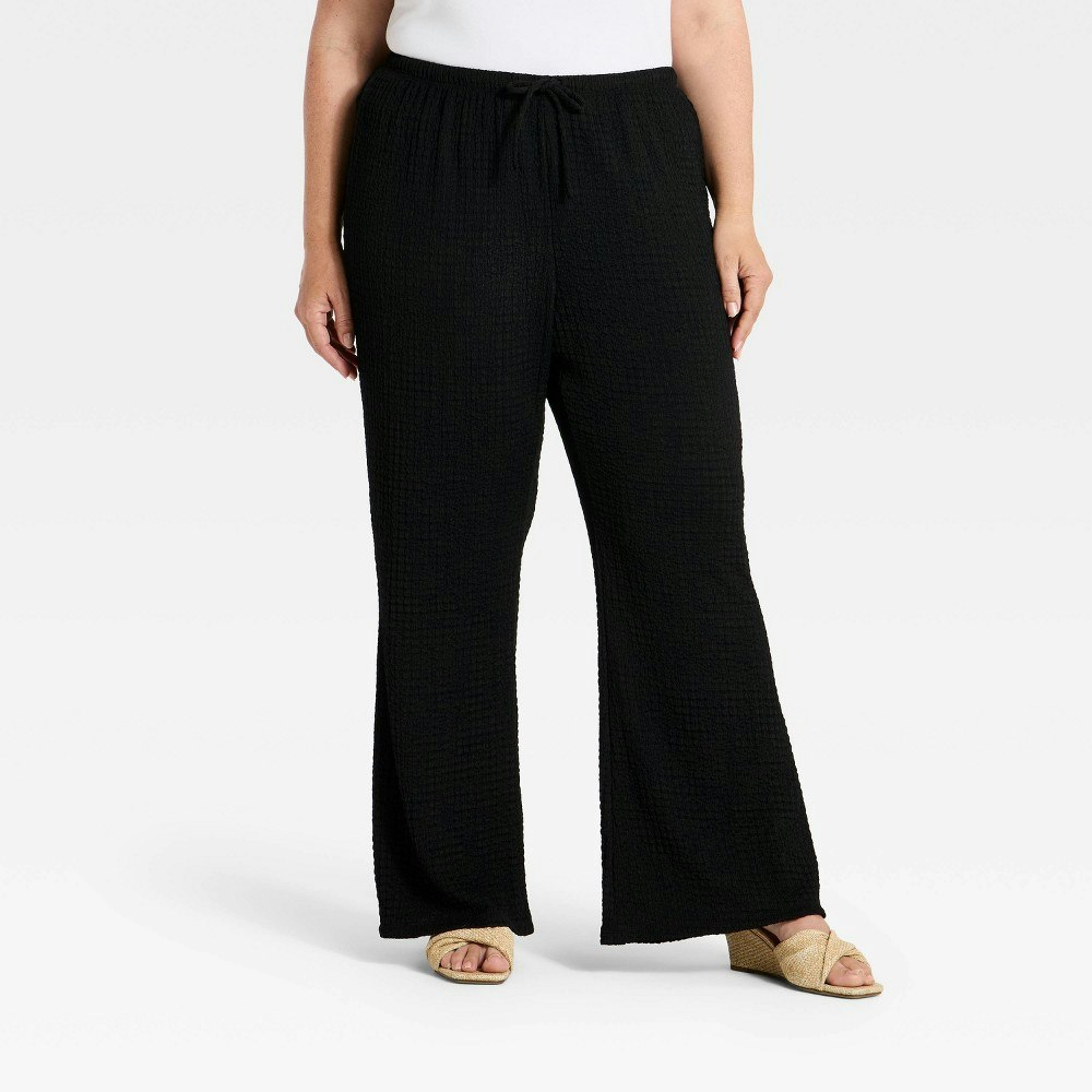 A New Day Women's Mid-Rise Tie-Front Textured Knit Flare Pants: $35
