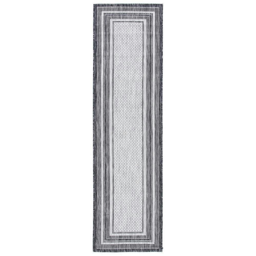 Courtyard 2 x 14-Foot Striped Indoor/Outdoor Runner Rug: $59