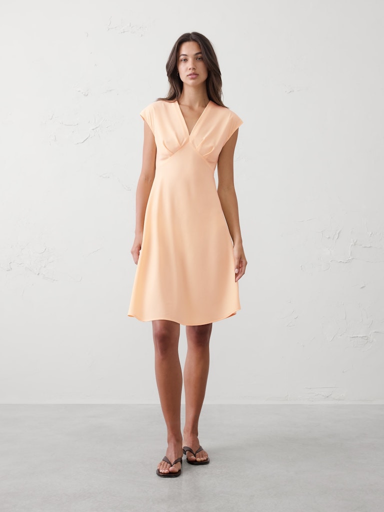 Back-Tie Mini Dress: $36 Back-Tie Mini Dress: $36
