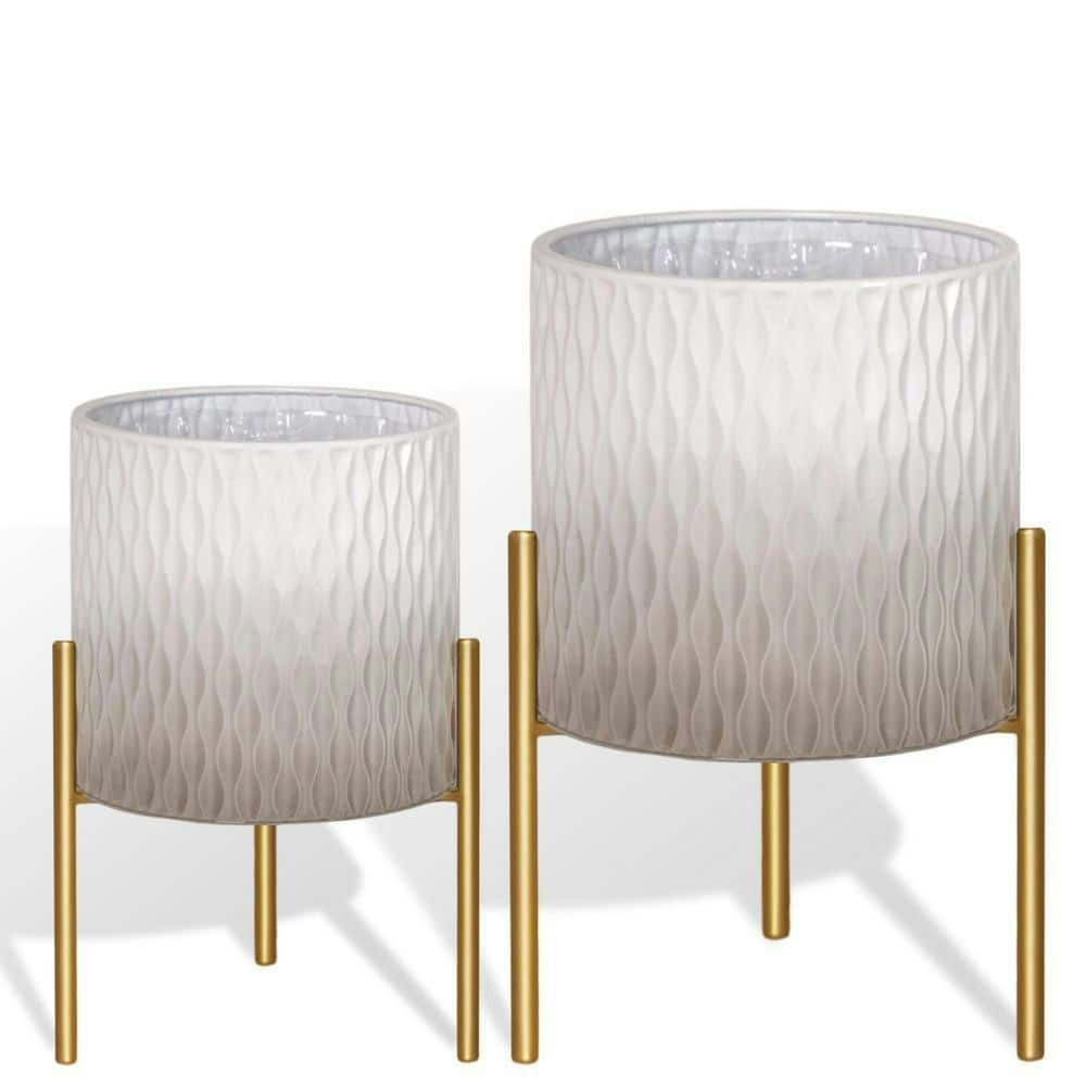 8.25-inch and 10.5-inch Gray Iron Decorative Floor Planters 2-Pack: $189.99 8.25-inch and 10.5-inch Gray Iron Decorative Floor Planters 2-Pack: $189.99