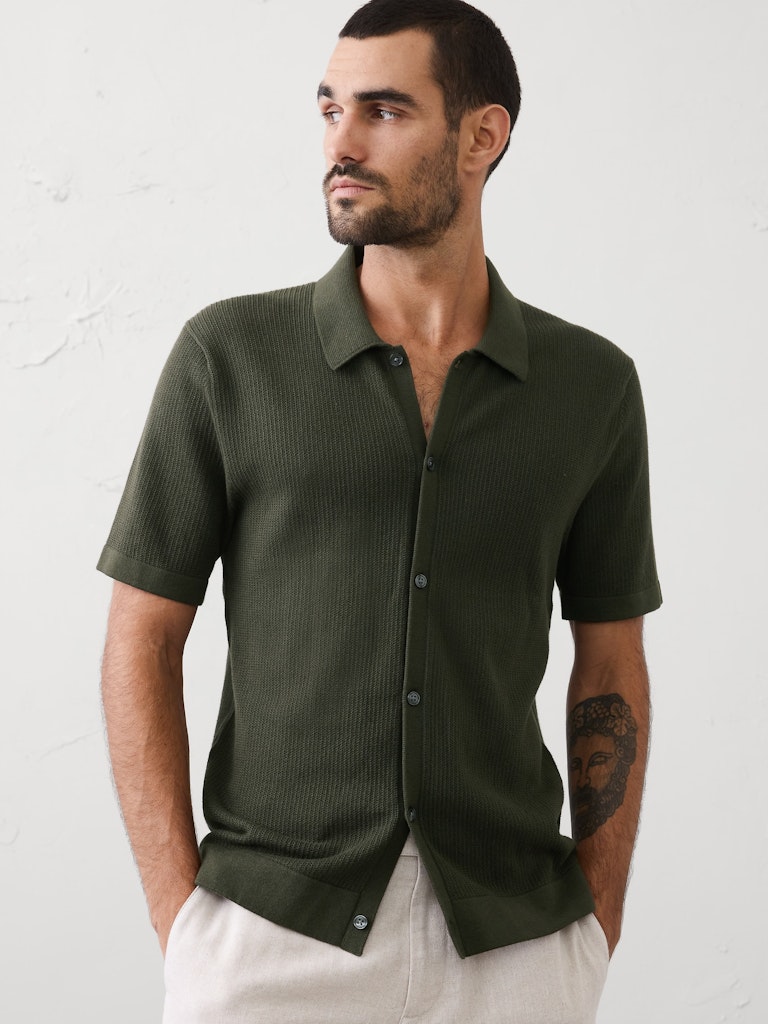 Button-Down Sweater Polo: $59.97 Button-Down Sweater Polo: $59.97