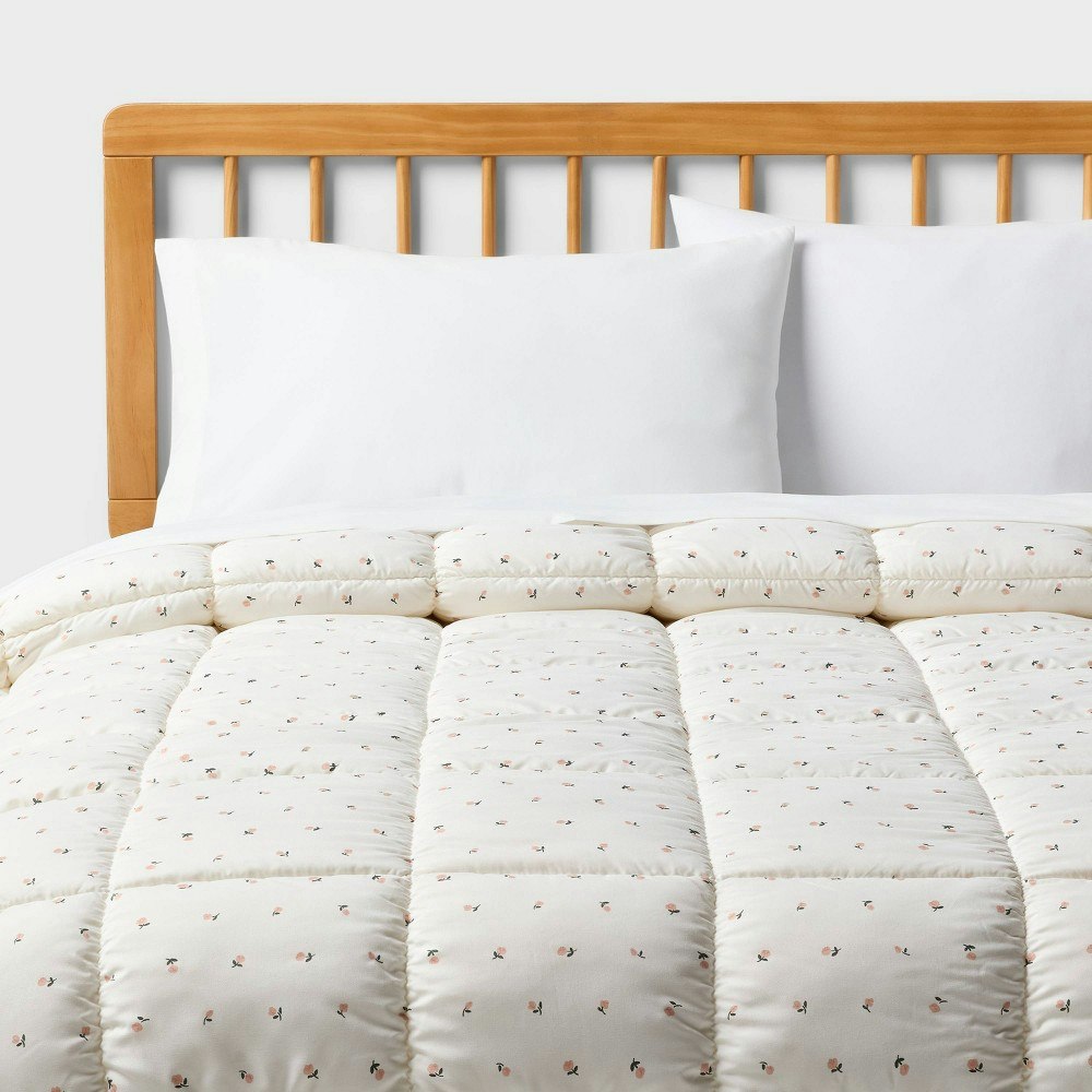 Room Essentials Twin/Twin XL Tulip Floral Puffer Comforter: $30 Room Essentials Twin/Twin XL Tulip Floral Puffer Comforter: $30