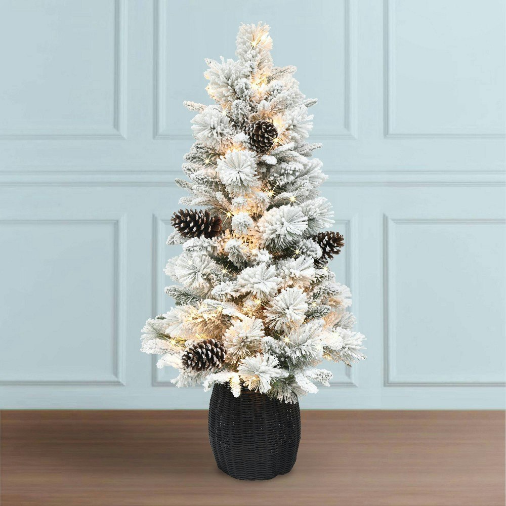 Puleo 4.5-Foot Pre-Lit Flocked Potted Artificial Christmas Tree: $295.99 Puleo 4.5-Foot Pre-Lit Flocked Potted Artificial Christmas Tree: $295.99