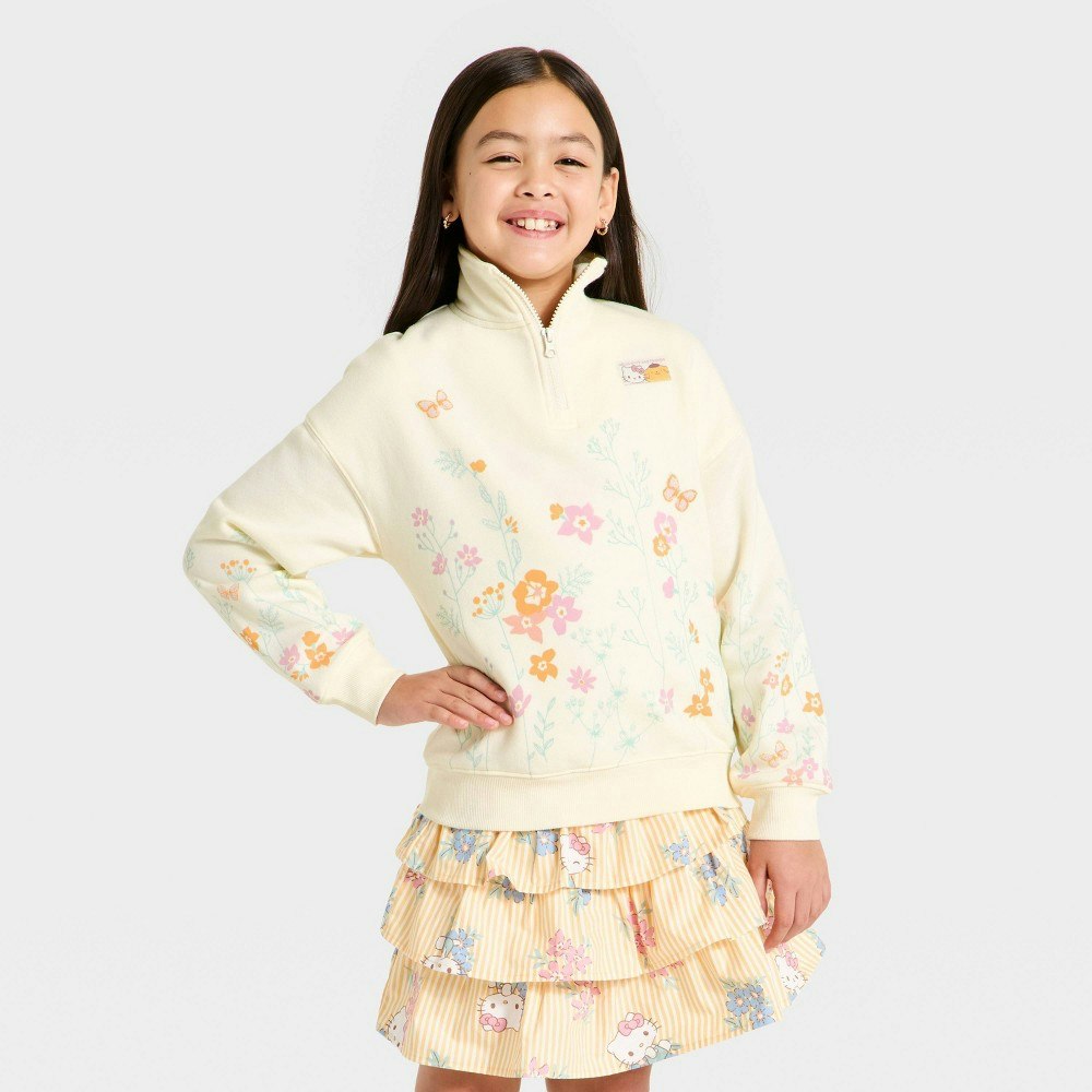 Girls' Hello Kitty and Pompompurin Floral 1/4 Zip-Up Sweatshirt: $20 Girls' Hello Kitty and Pompompurin Floral 1/4 Zip-Up Sweatshirt: $20