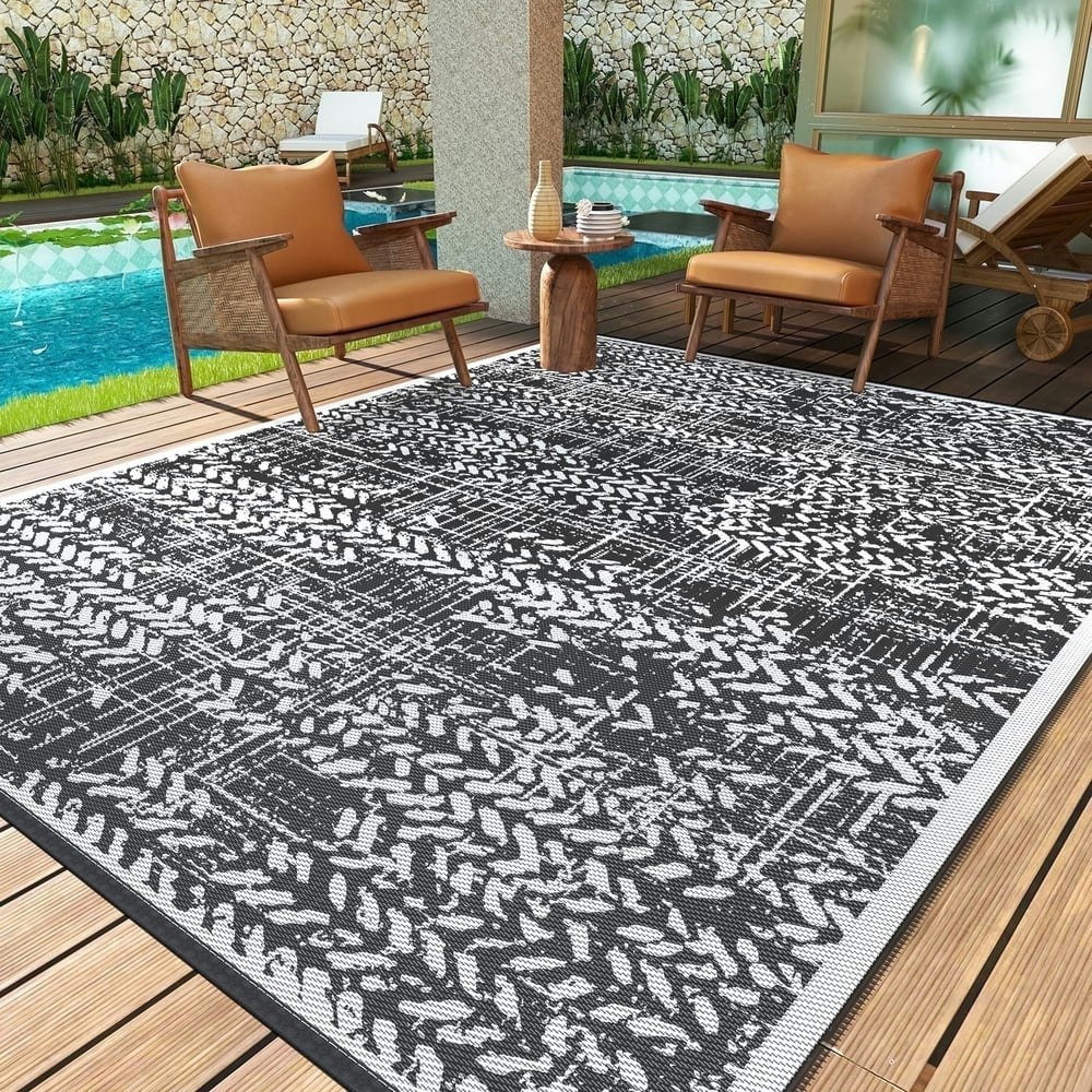 Vunate 5'x8' Reversible Plastic Straw Outdoor Rug: $17.99