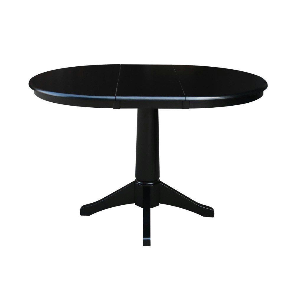 International Concepts 36-Inch Magnolia Round Dining Table: $503.99 International Concepts 36-Inch Magnolia Round Dining Table: $503.99