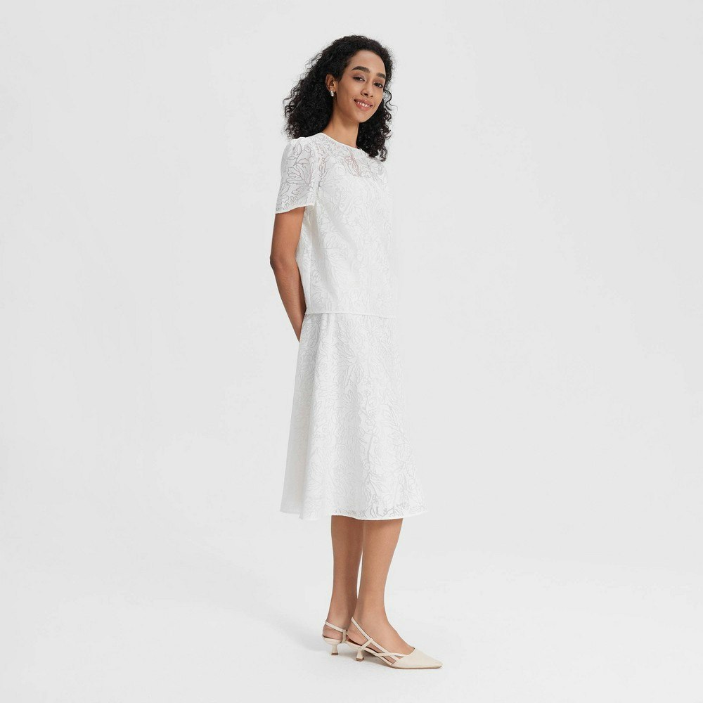 A New Day Women's Short Sleeve Semi-Sheer Jacquard Blouse: $35 A New Day Women's Short Sleeve Semi-Sheer Jacquard Blouse: $35
