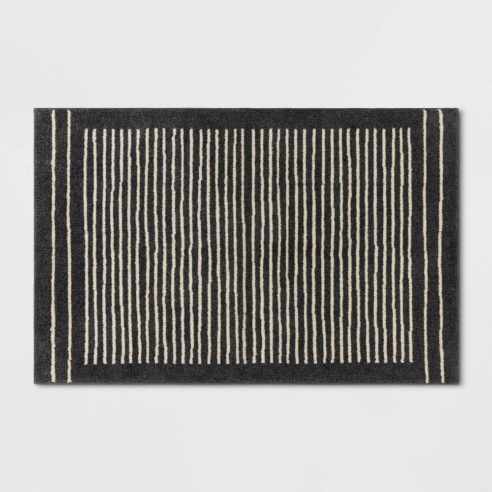 Threshold 2.5'x4' Knitted Stripe Area Rug: $35 Threshold 2.5'x4' Knitted Stripe Area Rug: $35