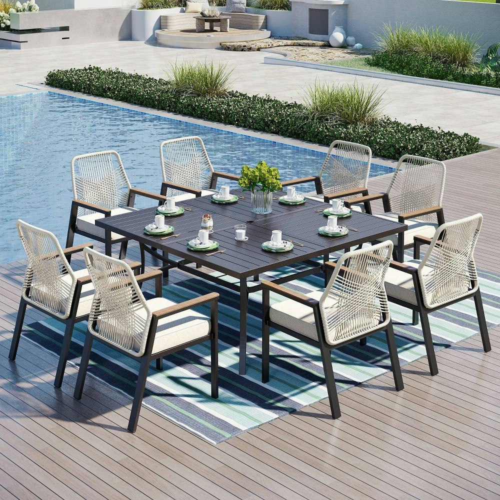 Captiva Designs 9-Piece Outdoor Slat-Top Dining Set: $1,209.99 Captiva Designs 9-Piece Outdoor Slat-Top Dining Set: $1,209.99