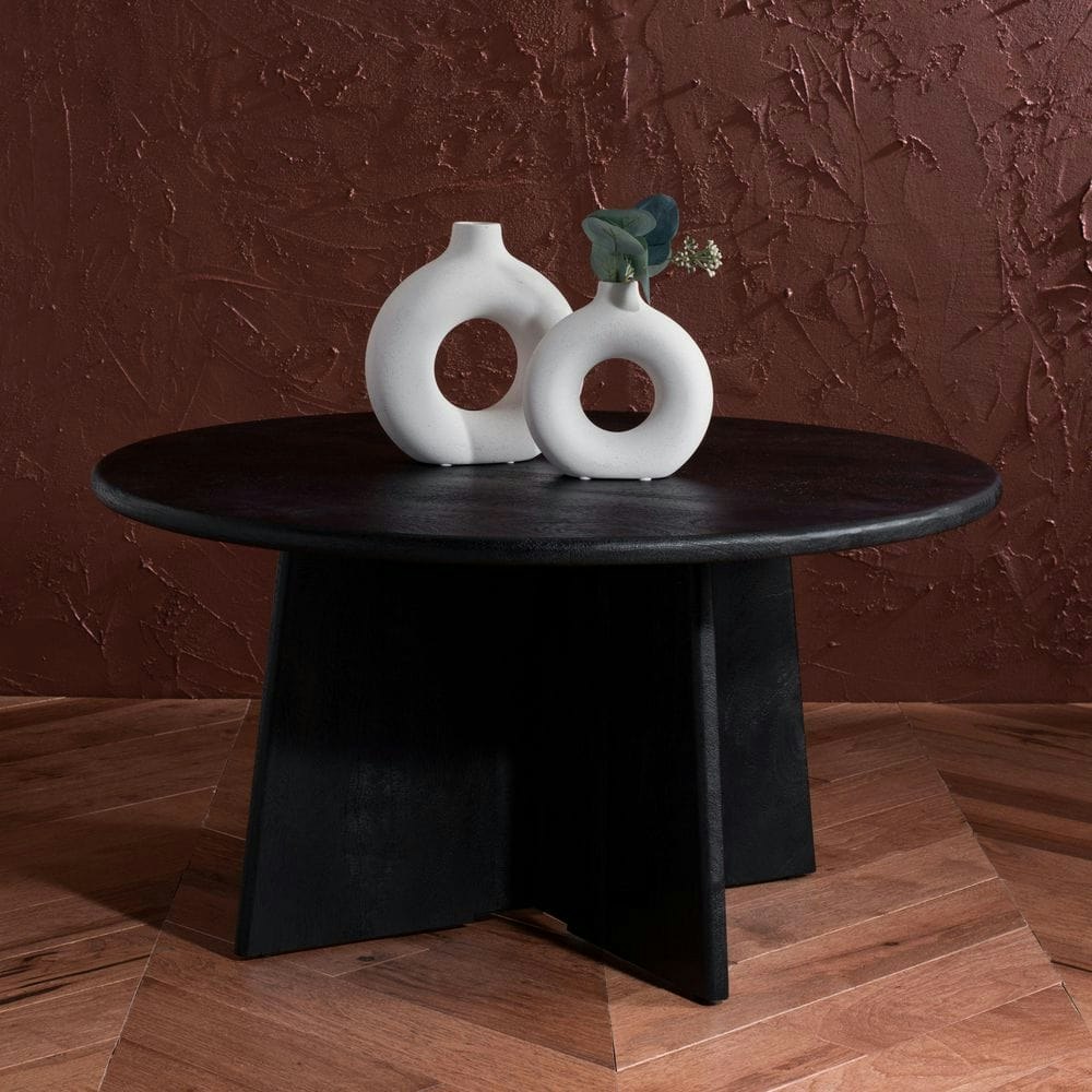 Madilynn 35-inch Round Wood Coffee Table: $591 Madilynn 35-inch Round Wood Coffee Table: $591