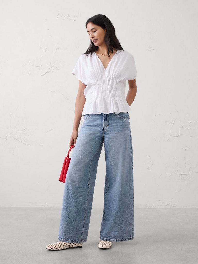 Wide-Leg Mid-Rise Jeans: $55 Wide-Leg Mid-Rise Jeans: $55