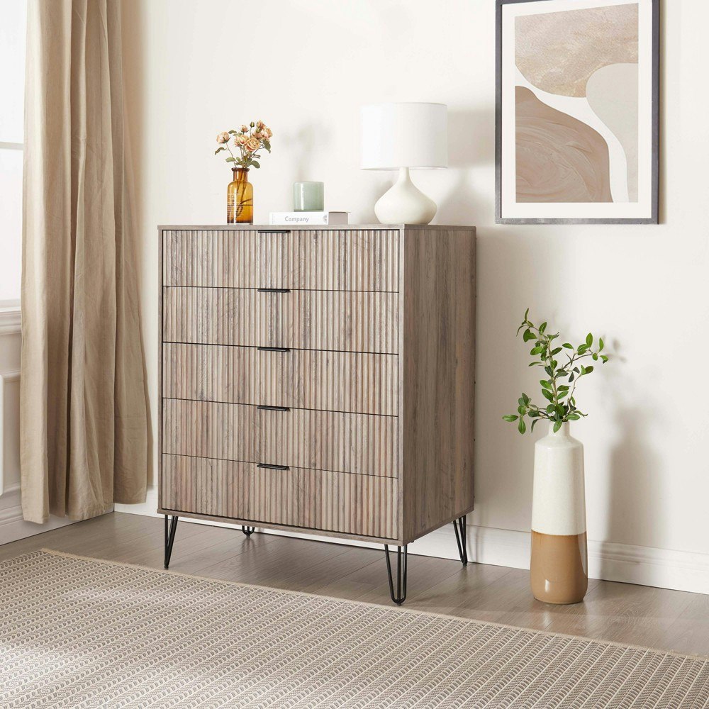 Manhattan Comfort Dumbo 5-Drawer Dresser: $519.99 Manhattan Comfort Dumbo 5-Drawer Dresser: $519.99