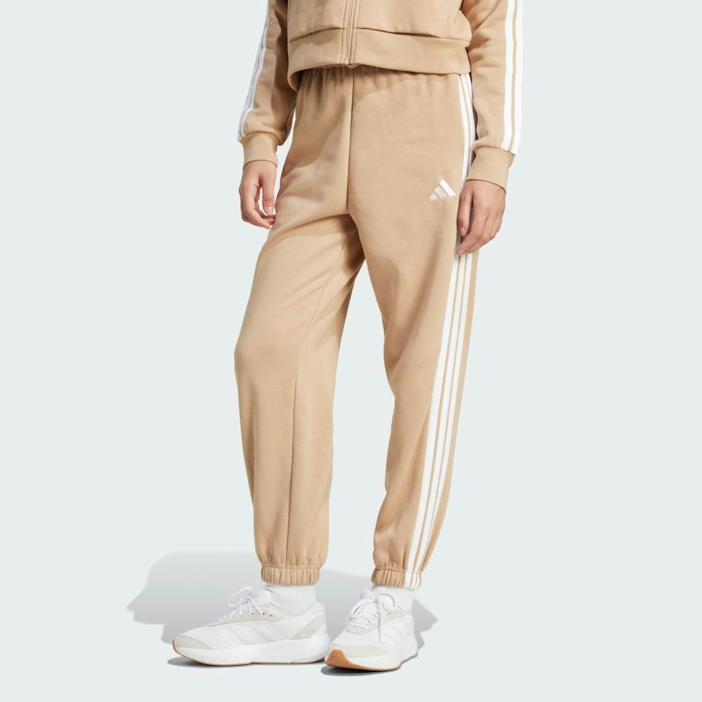 Adidas Essentials 3-Stripes Loose-Fit Fleece Pants: $50 Adidas Essentials 3-Stripes Loose-Fit Fleece Pants: $50