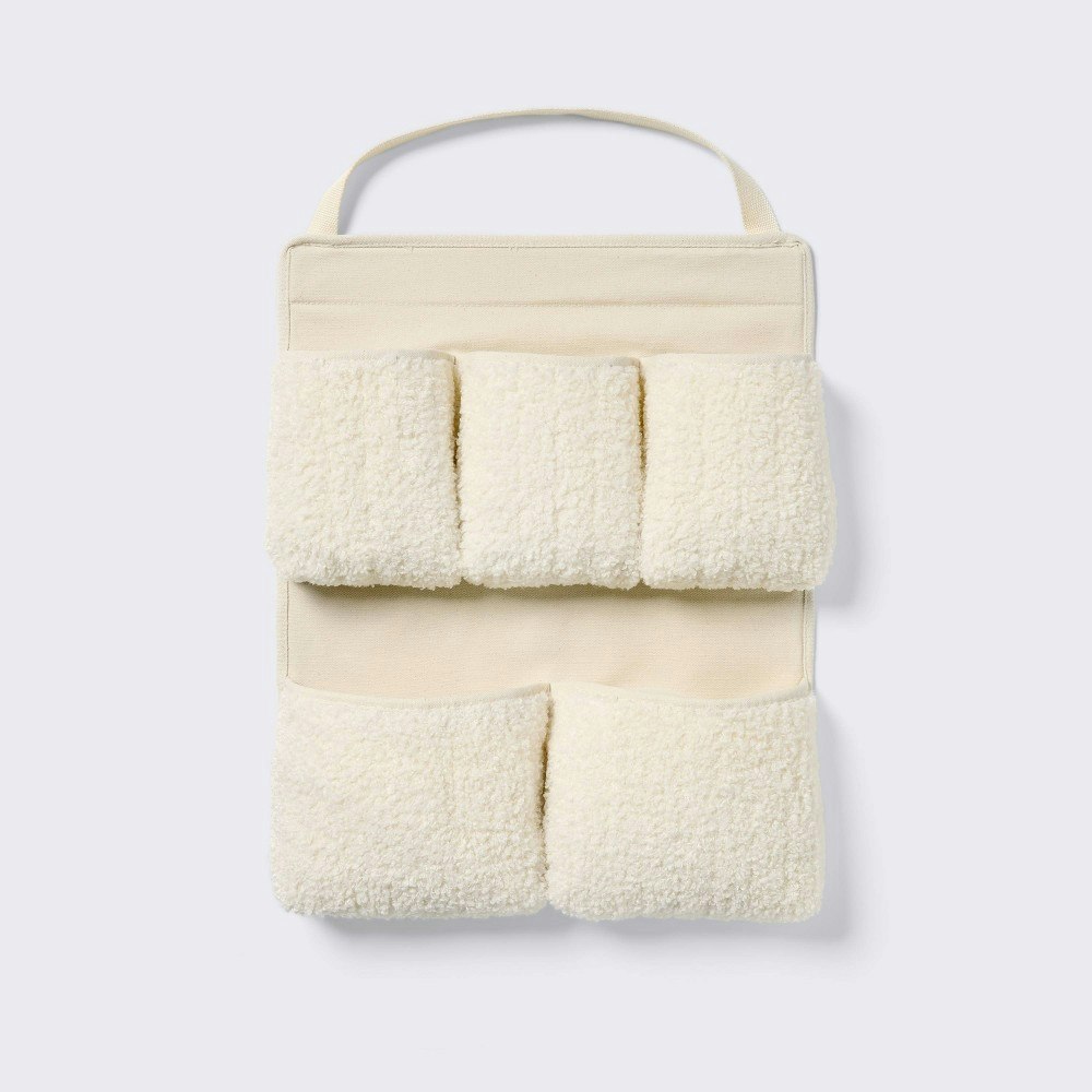 Cloud Island 5-Pocket Boucle Wall Hanging Storage: $19.99 Cloud Island 5-Pocket Boucle Wall Hanging Storage: $19.99