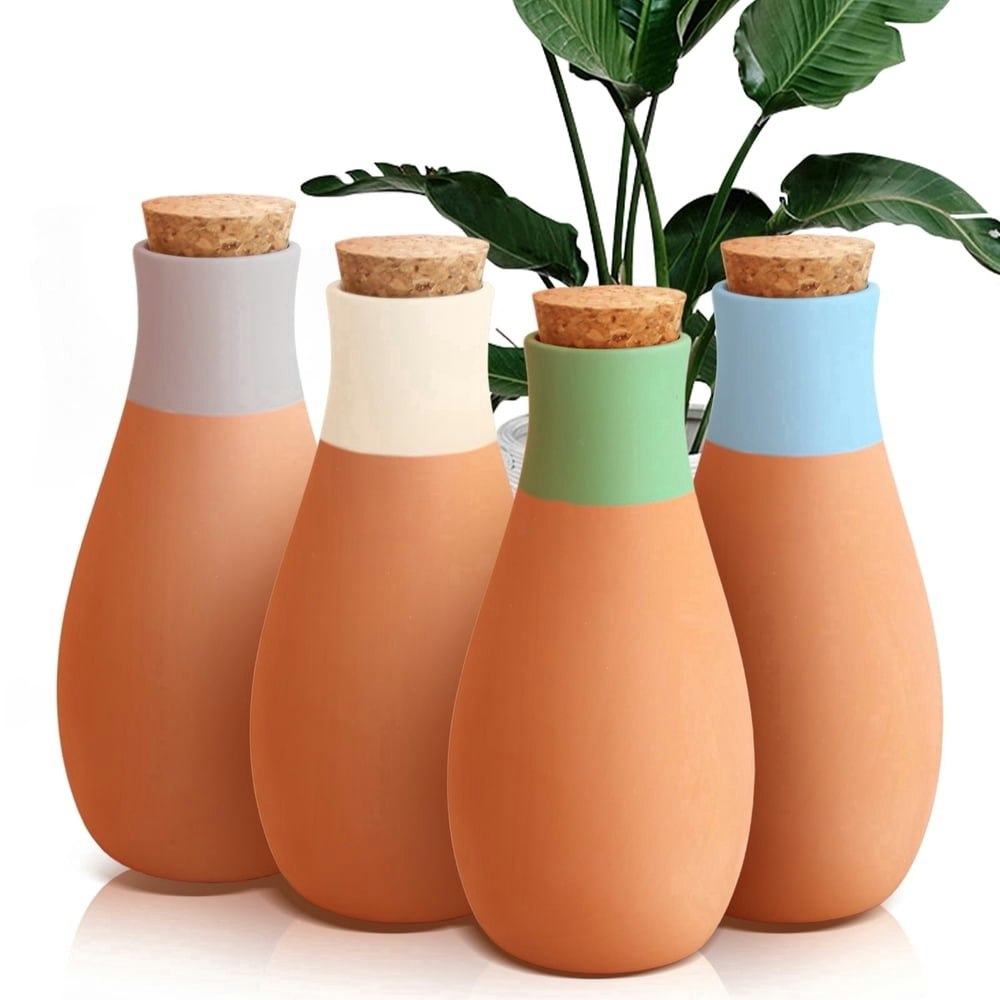 Ollas Terracotta Watering Spikes 4-Pack: $24.29 Ollas Terracotta Watering Spikes 4-Pack: $24.29