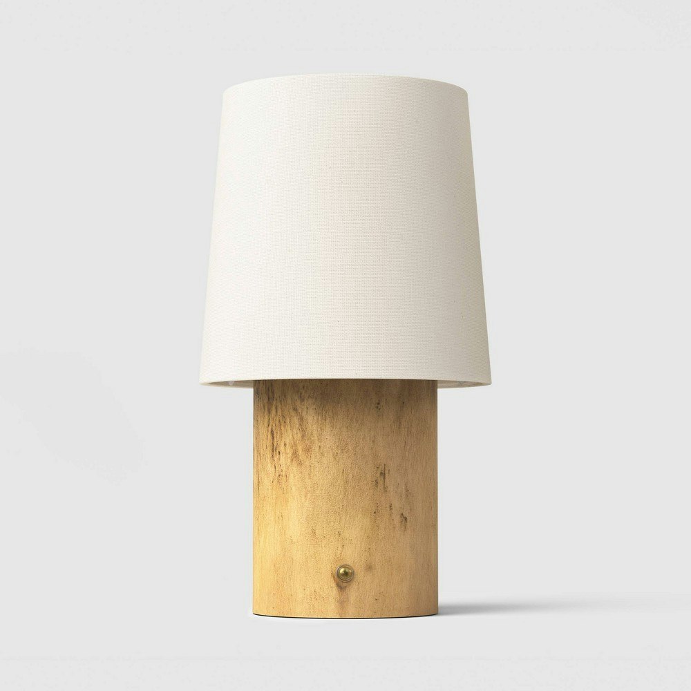 Threshold 13-inch Faux Wood Portable Table Lamp: $25 Threshold 13-inch Faux Wood Portable Table Lamp: $25