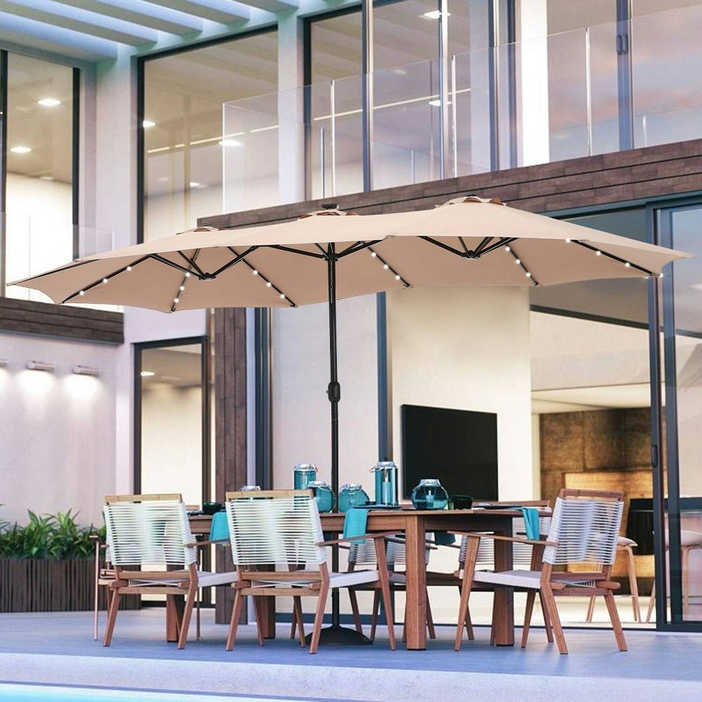 Captiva Designs 15' x 9' Rectangular Lit Patio Market Umbrella with Base and Sand Bags: $188.99 Captiva Designs 15' x 9' Rectangular Lit Patio Market Umbrella with Base and Sand Bags: $188.99