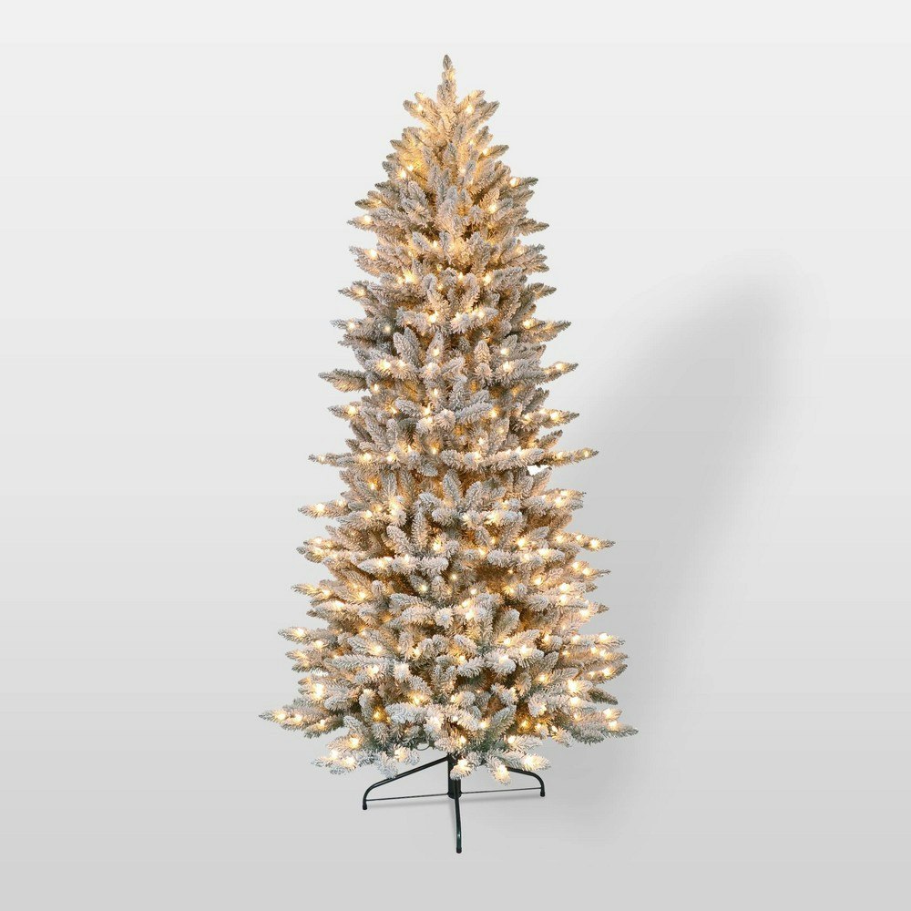 Puleo 6.5-Foot Pre-Lit Flocked Forest Fir Artificial Christmas Tree: $153.71