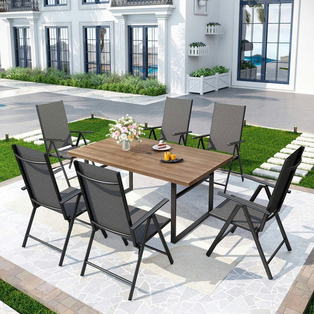Captiva Designs 7-Piece Patio Dining Set: $599.99 Captiva Designs 7-Piece Patio Dining Set: $599.99