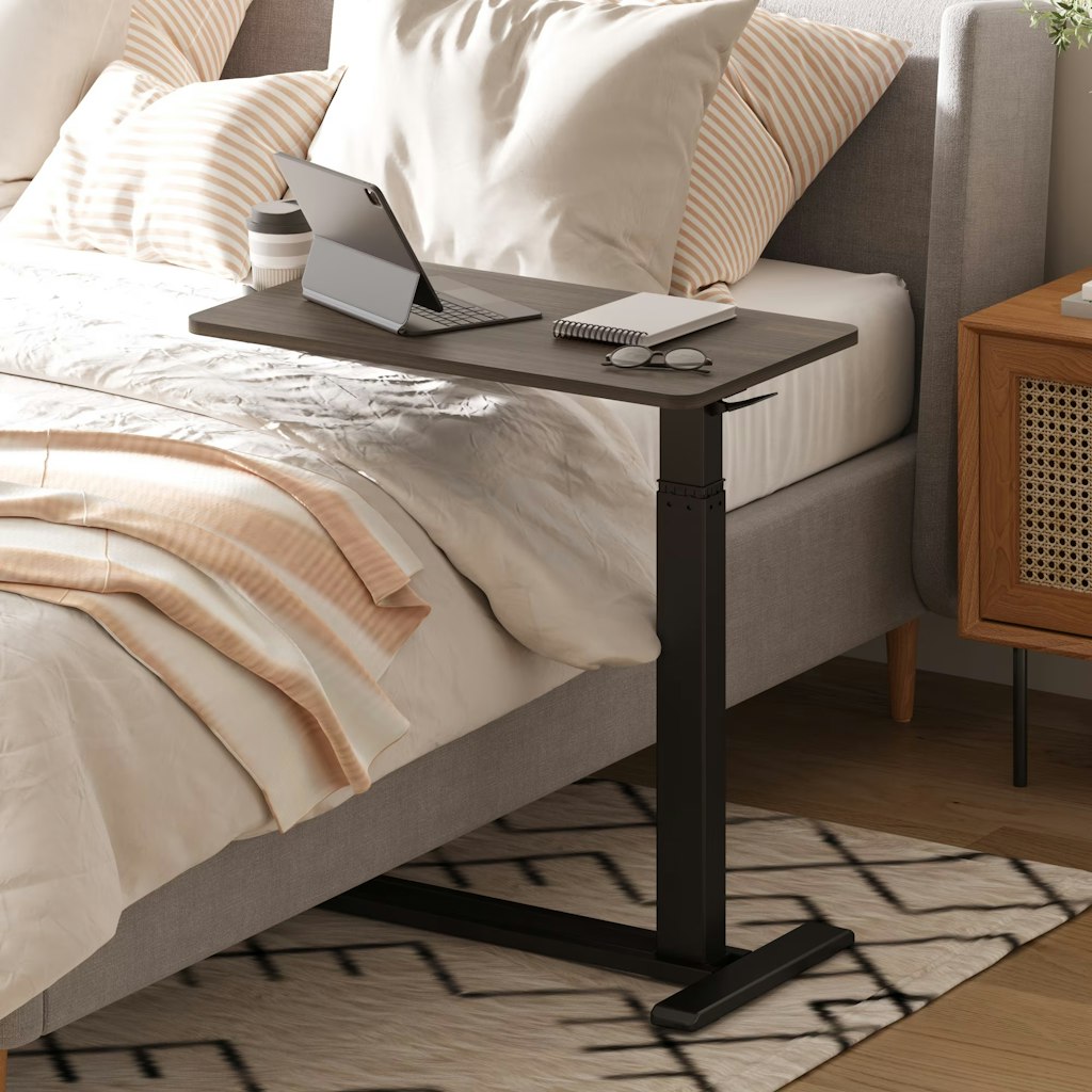 FitStand Height Adjustable Rolling Overbed Table: $76 FitStand Height Adjustable Rolling Overbed Table: $76