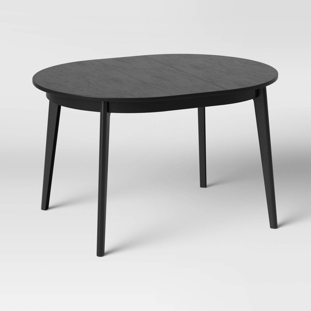 Astrid Mid-Century Round Extendable Dining Table: $300 Astrid Mid-Century Round Extendable Dining Table: $300