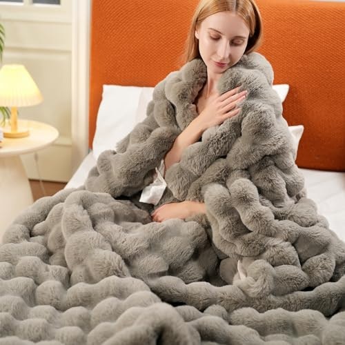 75" x 90" Faux Rabbit Fur Throw Blanket: $49.99 75" x 90" Faux Rabbit Fur Throw Blanket: $49.99