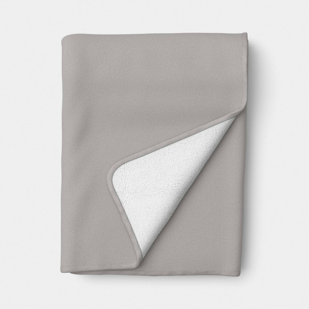 Room Essentials Chenille and Faux Shearling Throw Blanket: $14 Room Essentials Chenille and Faux Shearling Throw Blanket: $14