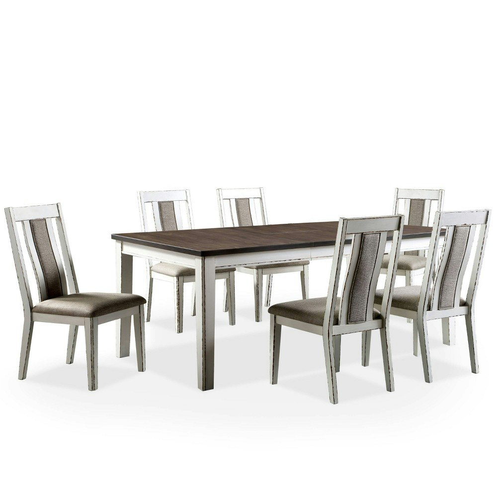 Homes: Inside + Out Redmond 7-Piece Expandable Dining Table Set: $2,799.99 Homes: Inside + Out Redmond 7-Piece Expandable Dining Table Set: $2,799.99