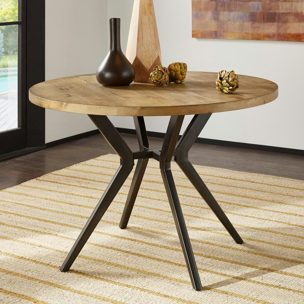 Pine Wood and Iron Round Dining Table: $381.76 Pine Wood and Iron Round Dining Table: $381.76