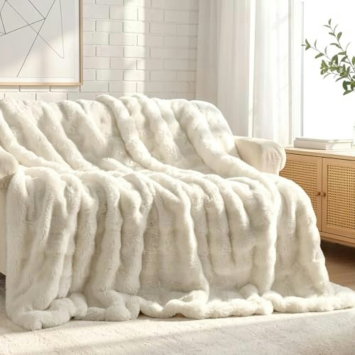 Wajade 90" x 106" Faux Fur Throw Blanket: $55.99 Wajade 90" x 106" Faux Fur Throw Blanket: $55.99