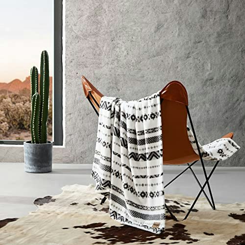 Wrangler 50" x 70" Soft Plush Throw Blanket: $16.38 Wrangler 50" x 70" Soft Plush Throw Blanket: $16.38
