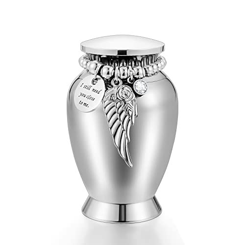 Small Keepsake Urn for Human Ashes 2.85-inch with Wing Charm: $32.99 Small Keepsake Urn for Human Ashes 2.85-inch with Wing Charm: $32.99