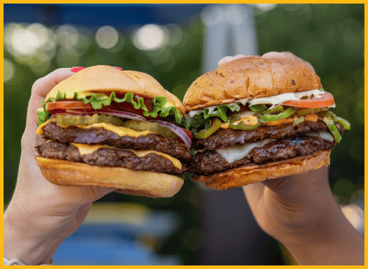 Smashburger Burgers or Big Dogs: Buy One, Get One Free