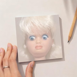 Disgusted Doll Face Memo Pad for $2 + free shipping w/ $25
