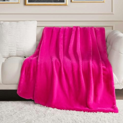 Juicy Couture 50" x 70" Faux Fur Throw Blanket: $20 Juicy Couture 50" x 70" Faux Fur Throw Blanket: $20