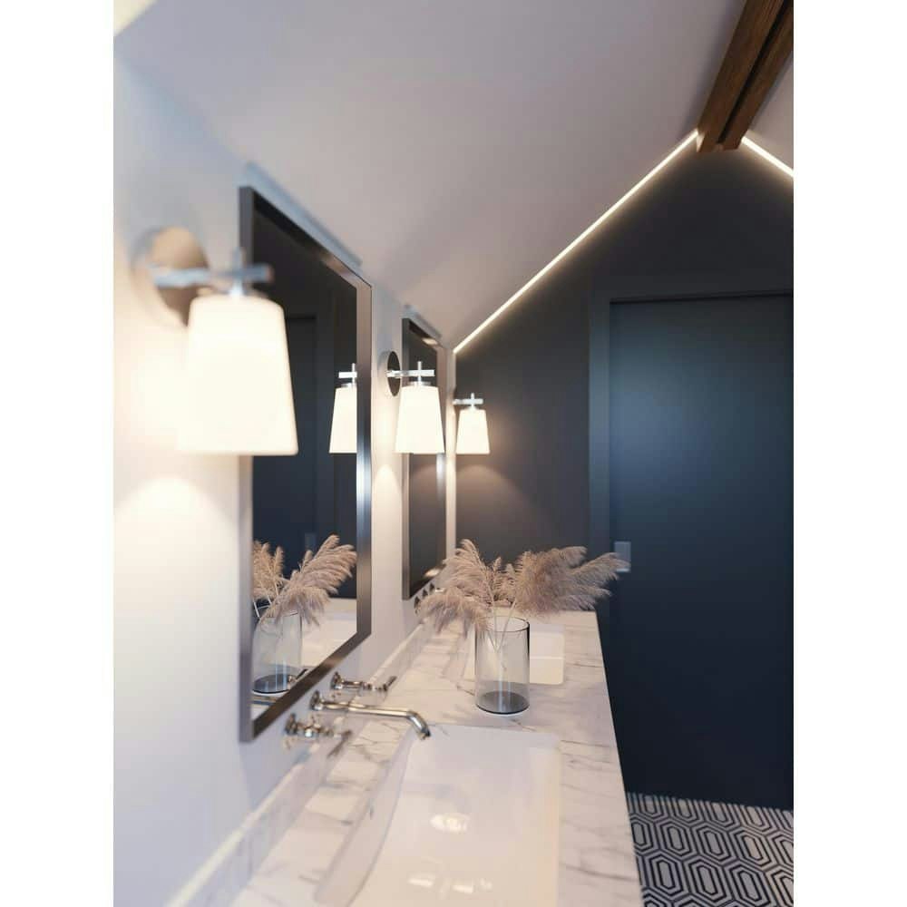 Joanna 1-Light Satin Nickel Wall Sconce: $72 Joanna 1-Light Satin Nickel Wall Sconce: $72